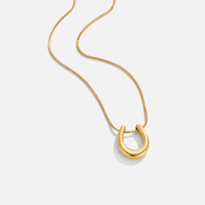 Collier doré s konskou podkovou