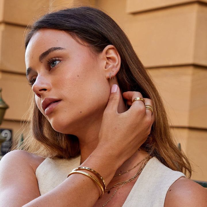 Boucles d’oreilles dorées 18K avec perles