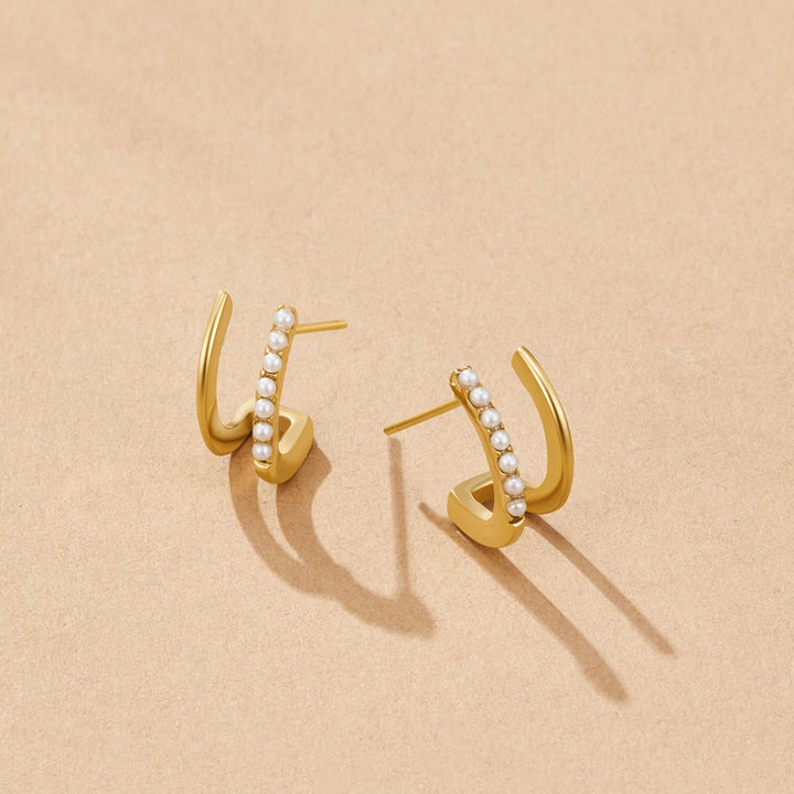 Boucles d’oreilles dorées 18K avec perles
