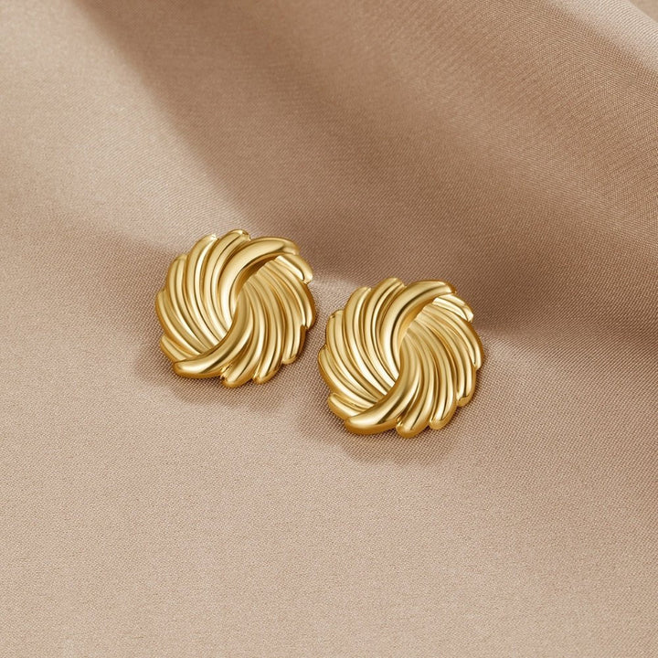 Boucles d’oreilles spirales dorées 18K