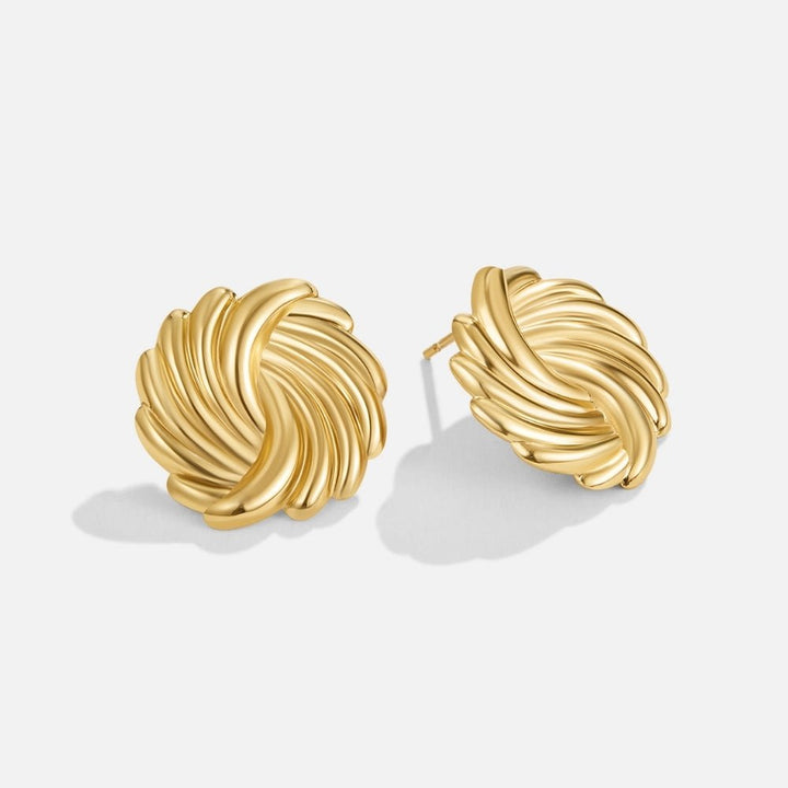 Boucles d’oreilles spirales dorées 18K