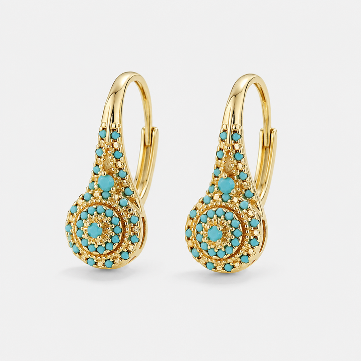 Boucles d’oreilles turquoise goutte avec détails dorés