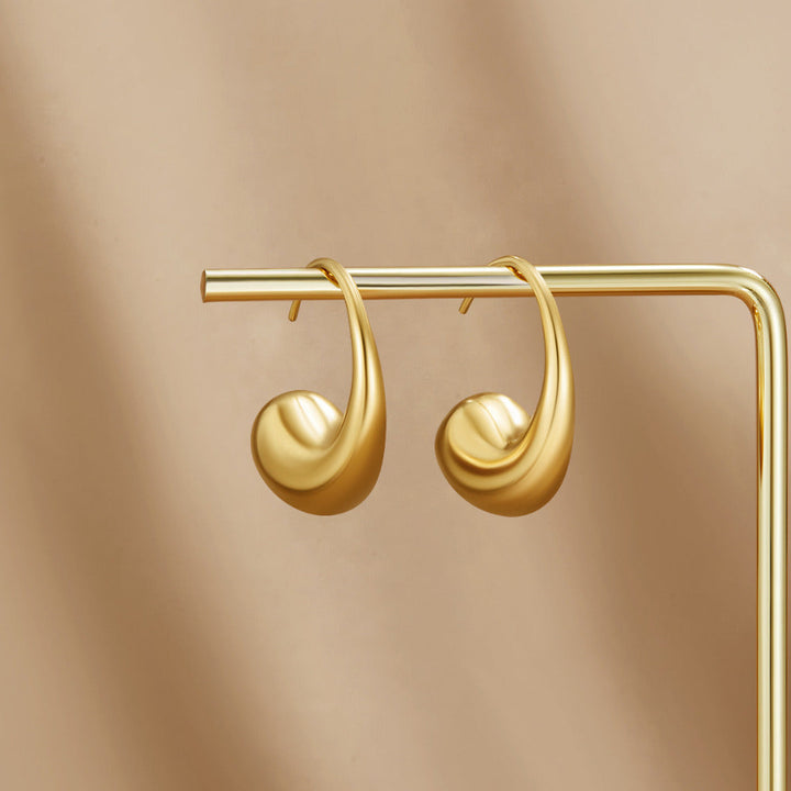 Boucles d’oreilles goutte dorées épaisses