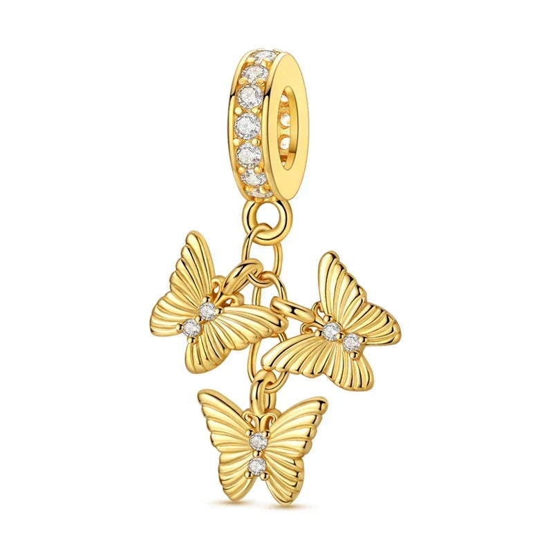 Charm Papillon doré - Maison Perle