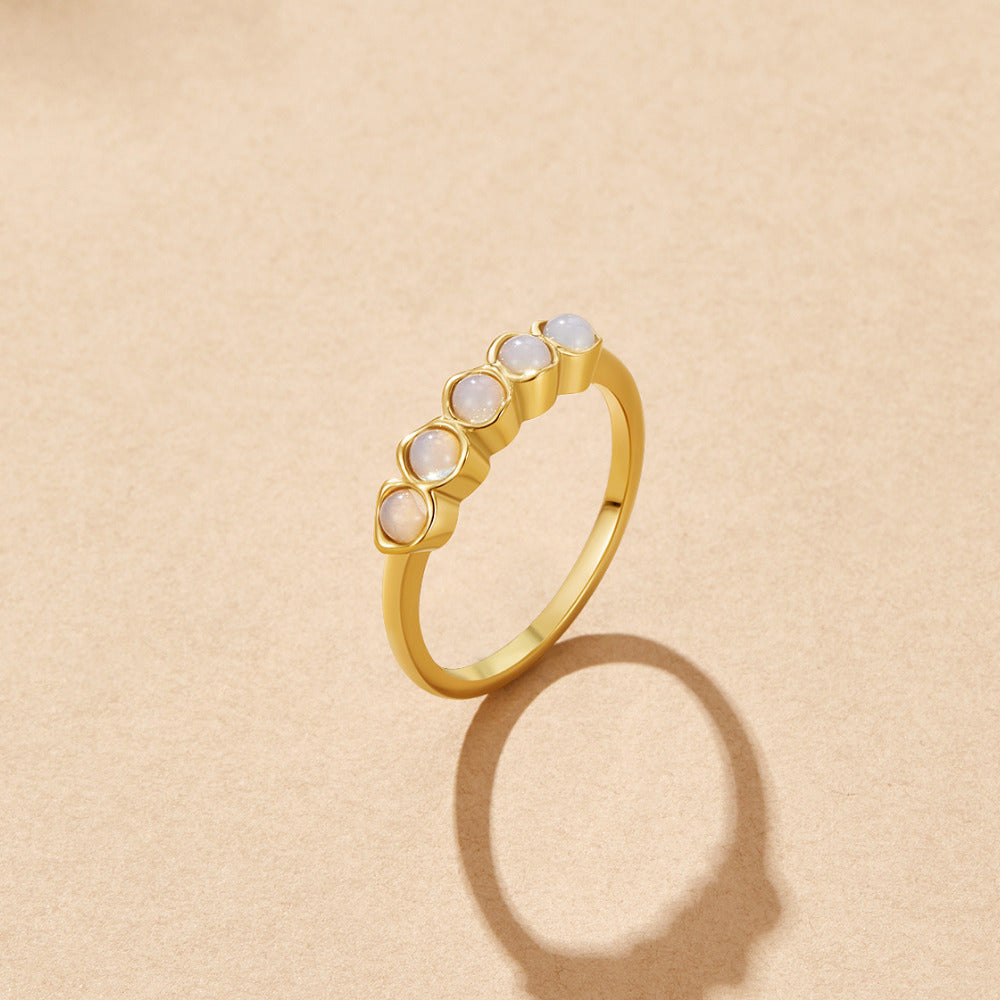 Bague dorée pierre de lune pierre éternité