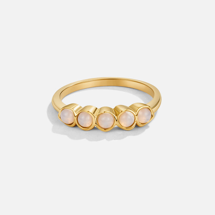 Bague dorée pierre de lune pierre éternité