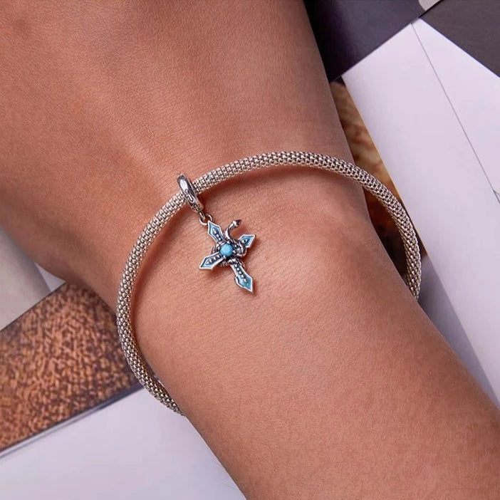 Charm Serpent avec croix - Maison Perle