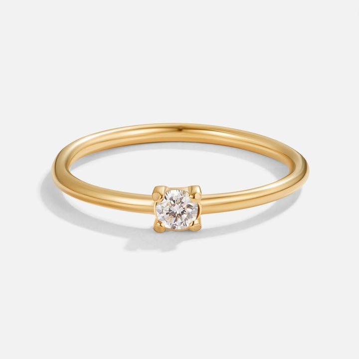 Bague dorée 18K avril pierre de naissance