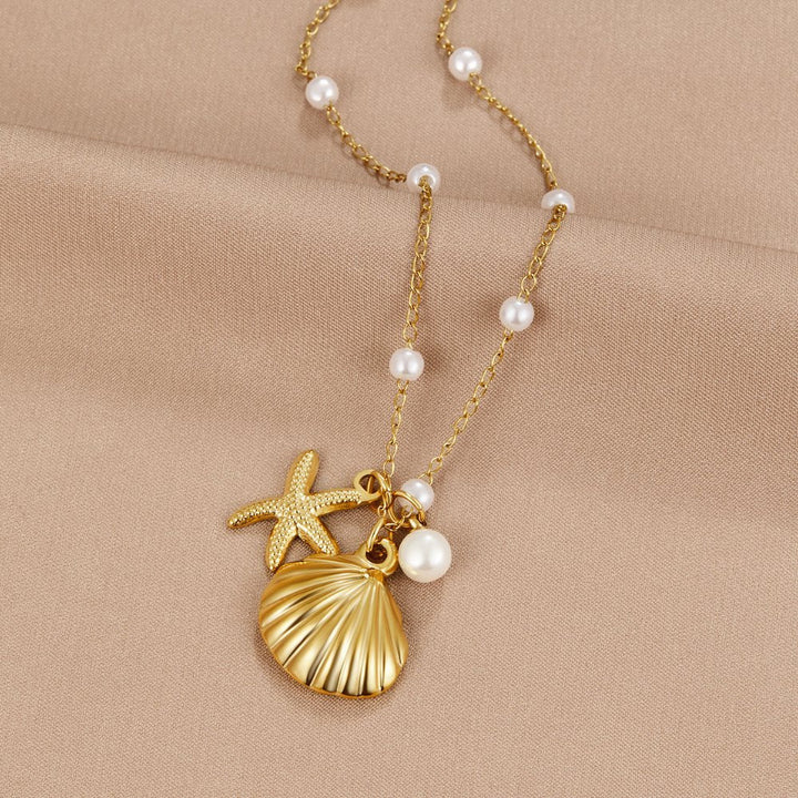 Collier s kúzlom mušle Aria