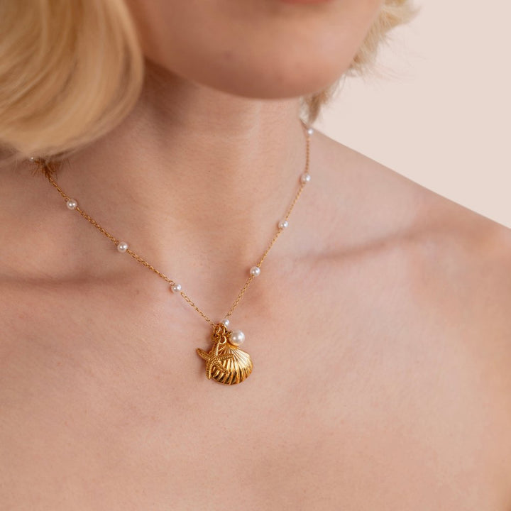 Collier s kúzlom mušle Aria