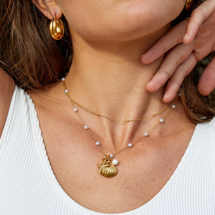 Collier s kúzlom mušle Aria