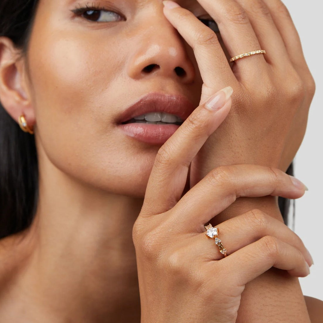 Bague dorée et cristal Arquette