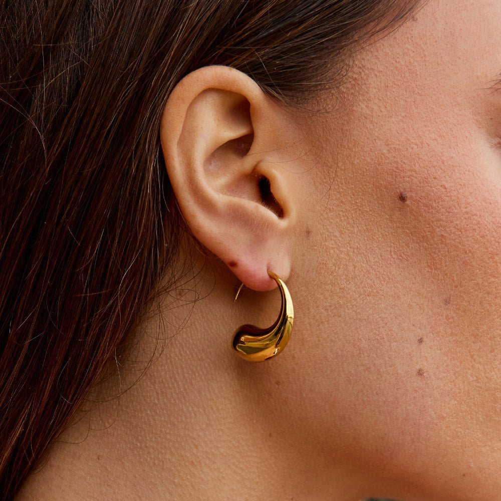 Boucles d’oreilles goutte dorées épaisses