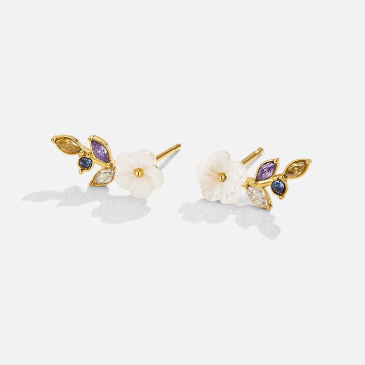 Boucles d’oreilles florales blanches avec cristaux