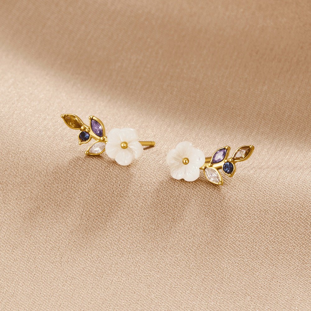 Boucles d’oreilles florales blanches avec cristaux