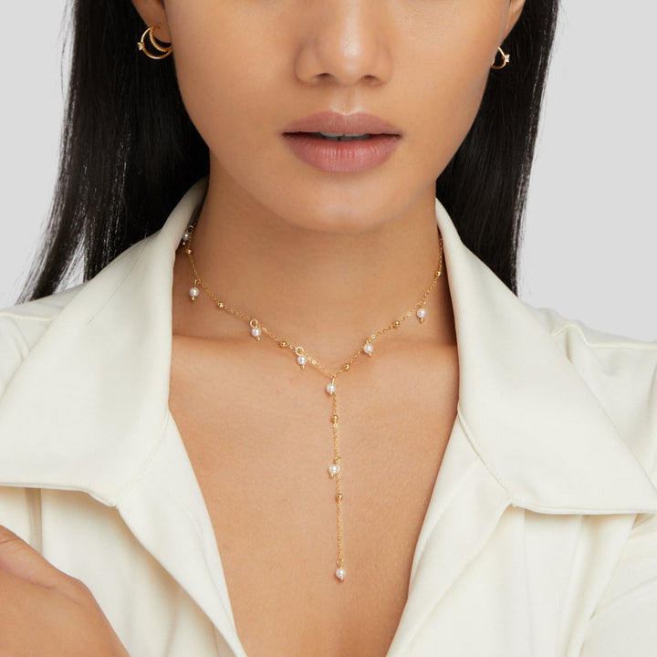 Collier lariat avec pendentif perle