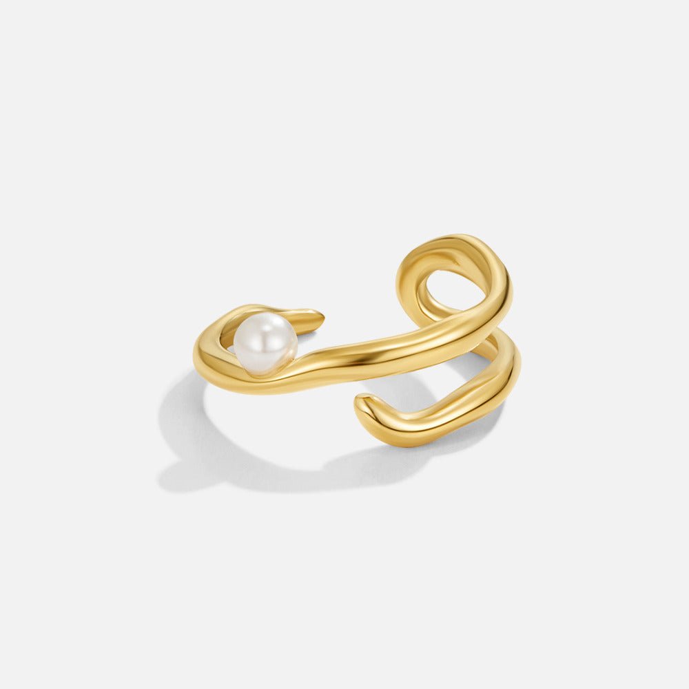 Bague géométrique dorée et perles