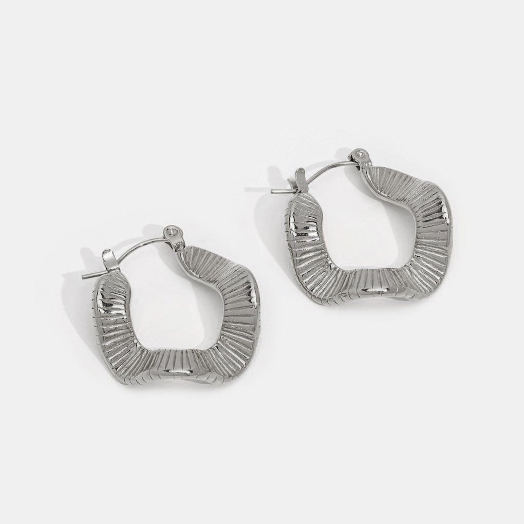 Boucles d’oreilles géométriques argentées