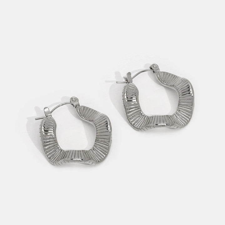Boucles d’oreilles géométriques argentées