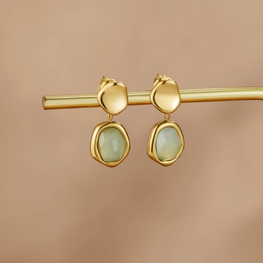 Boucles d’oreilles pendantes dorées aigue-marine