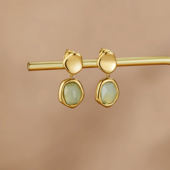 Boucles d’oreilles pendantes dorées aigue-marine
