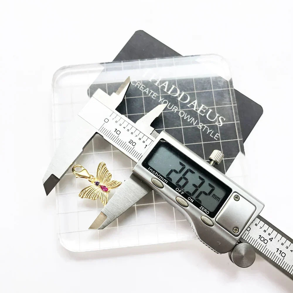 Charm Papillon doré - Maison Perle