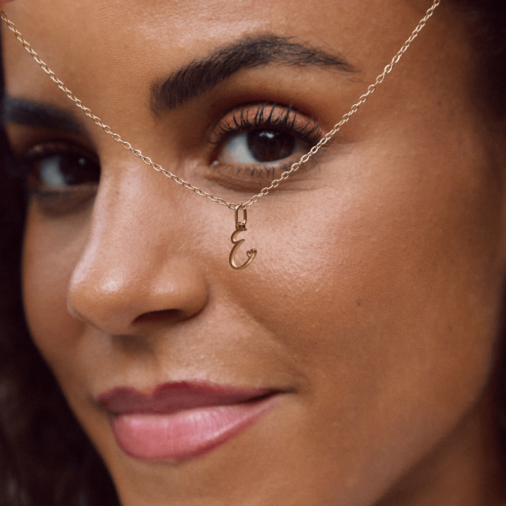 Collier cœur doré avec initiale
