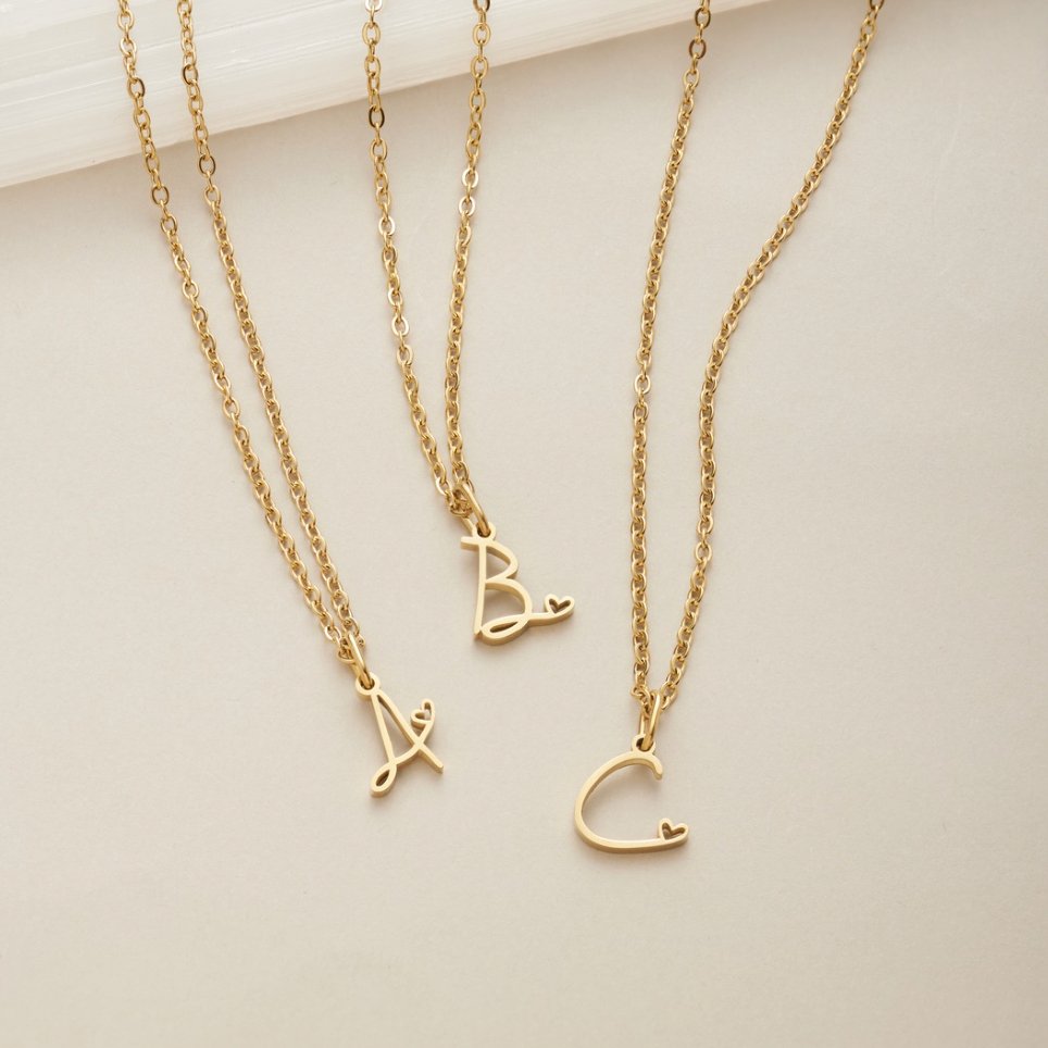 Collier cœur doré avec initiale