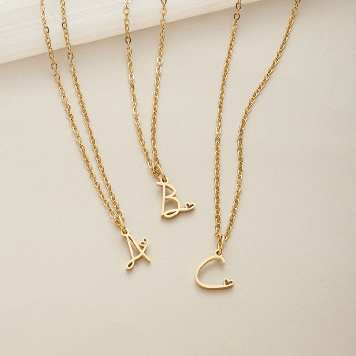Collier cœur doré avec initiale