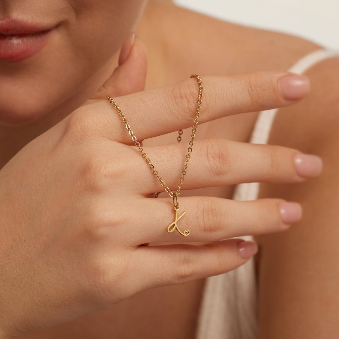 Collier cœur doré avec initiale
