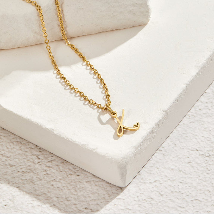 Collier cœur doré avec initiale