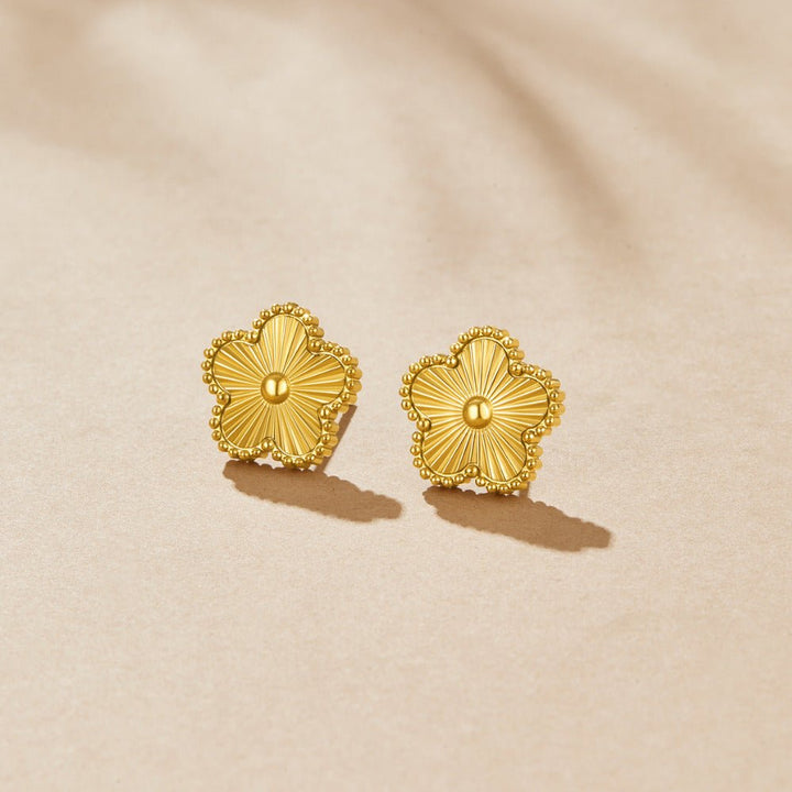 Boucles d’oreilles dorées trèfle à quatre feuilles