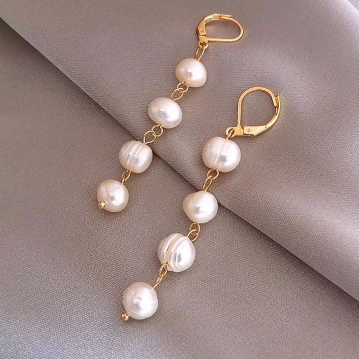 Boucles d’oreilles dorées en perles d’eau douce