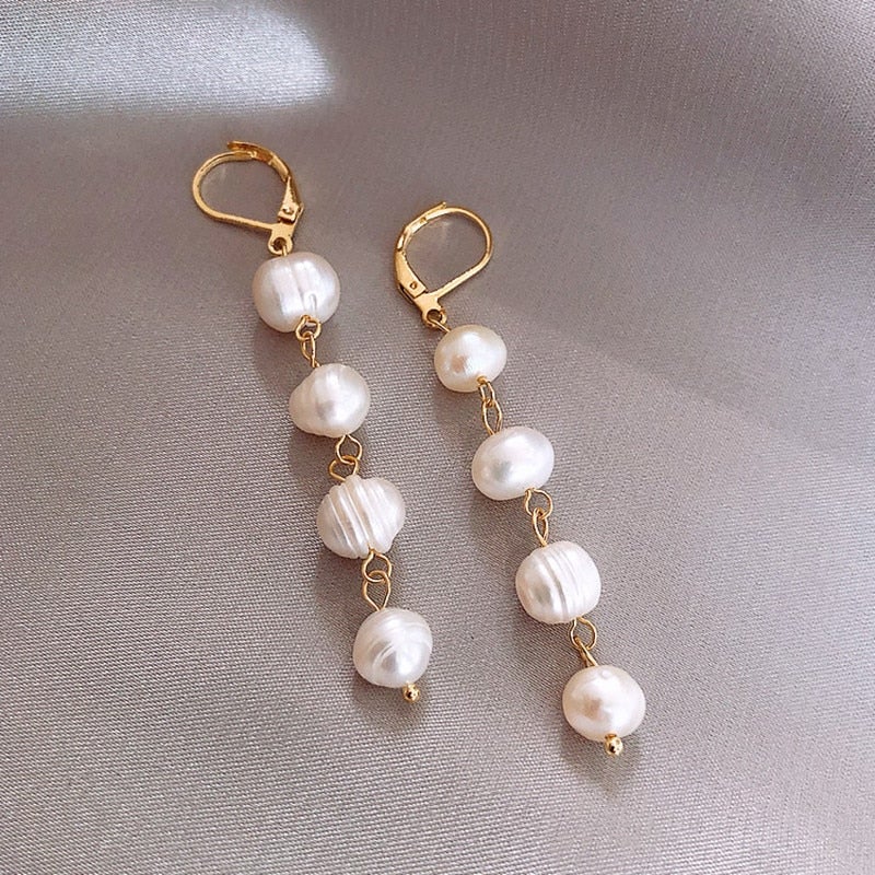 Boucles d’oreilles dorées en perles d’eau douce
