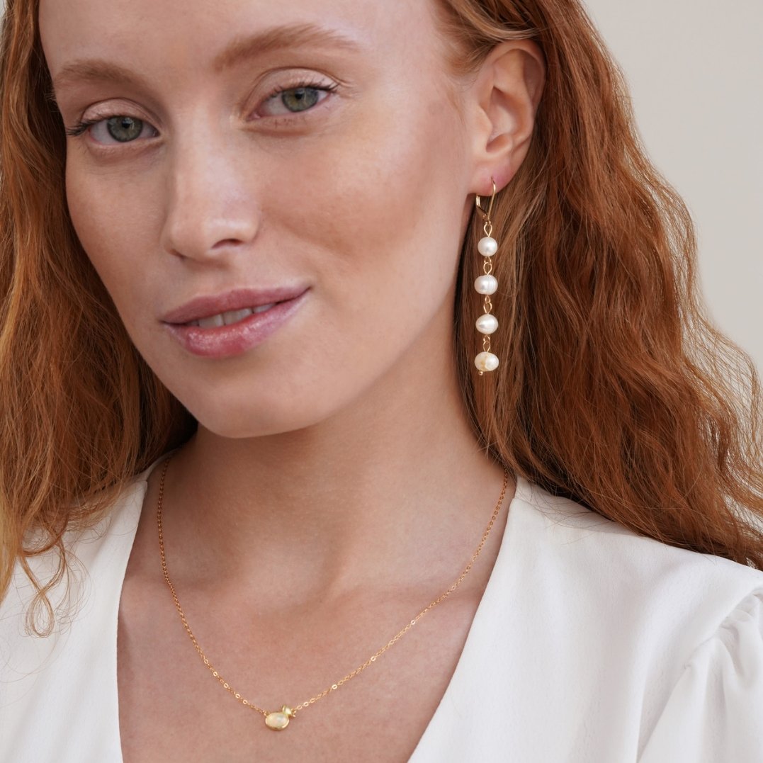 Boucles d’oreilles dorées en perles d’eau douce