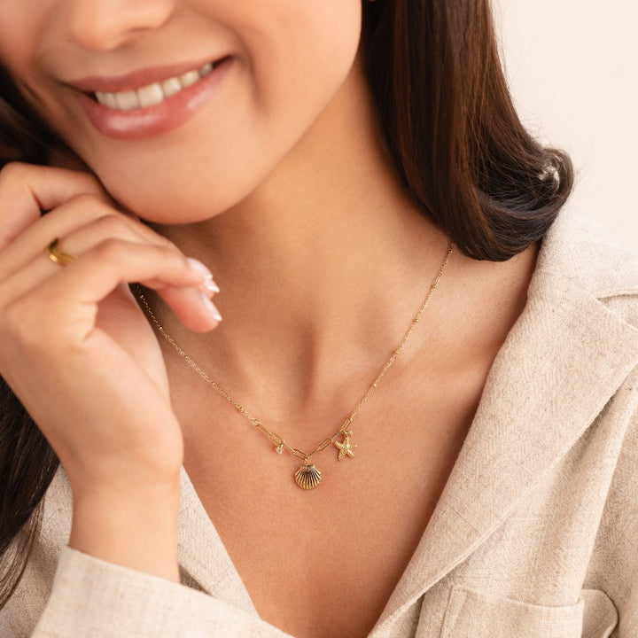 Zlatá mušľa a morská hviezda collier