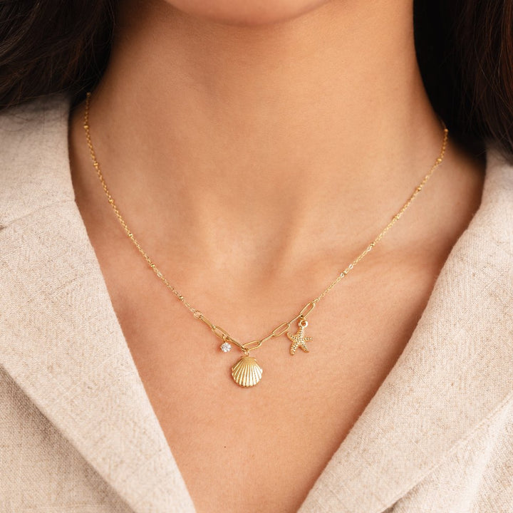 Zlatá mušľa a morská hviezda collier