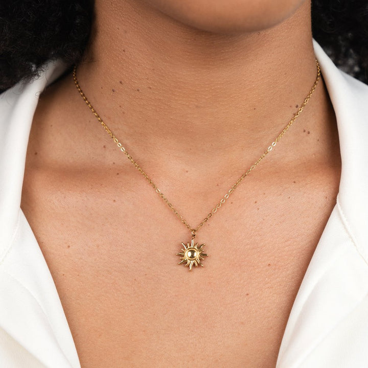 Pendentif soleil doré