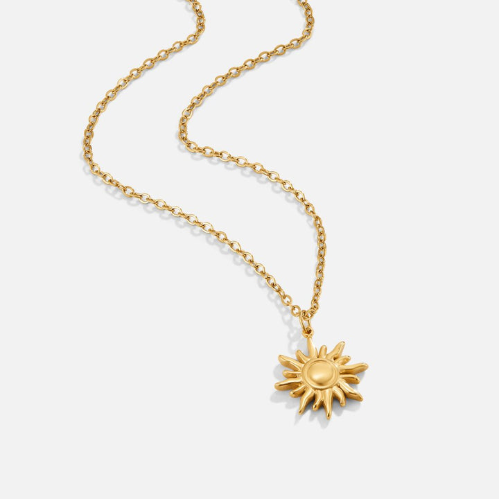 Pendentif soleil doré