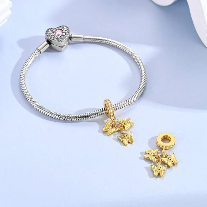 Charm Papillon doré - Maison Perle