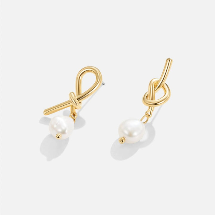 Boucles d’oreilles dorées avec perles d’eau douce