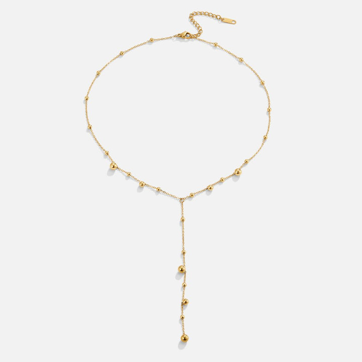 Collier so zlatými perlami a strapcami