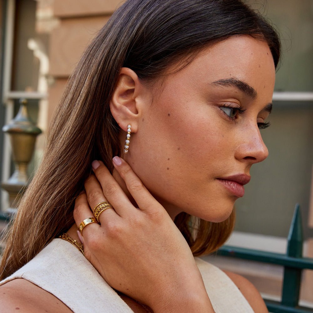 Boucles d’oreilles Maia dorées avec perles