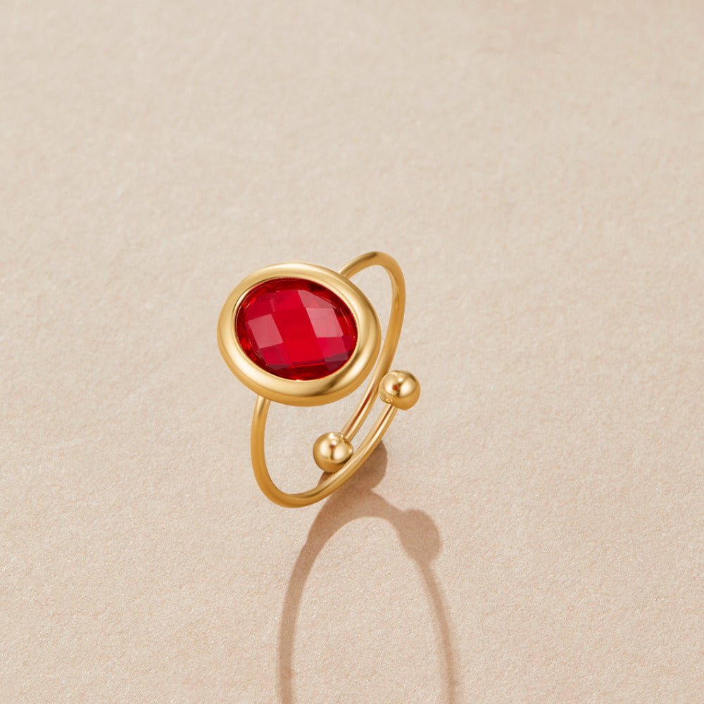 Bague dorée rubis cristal
