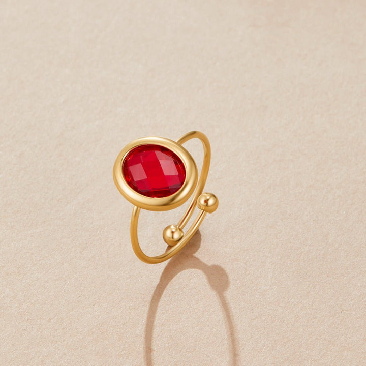 Bague dorée rubis cristal