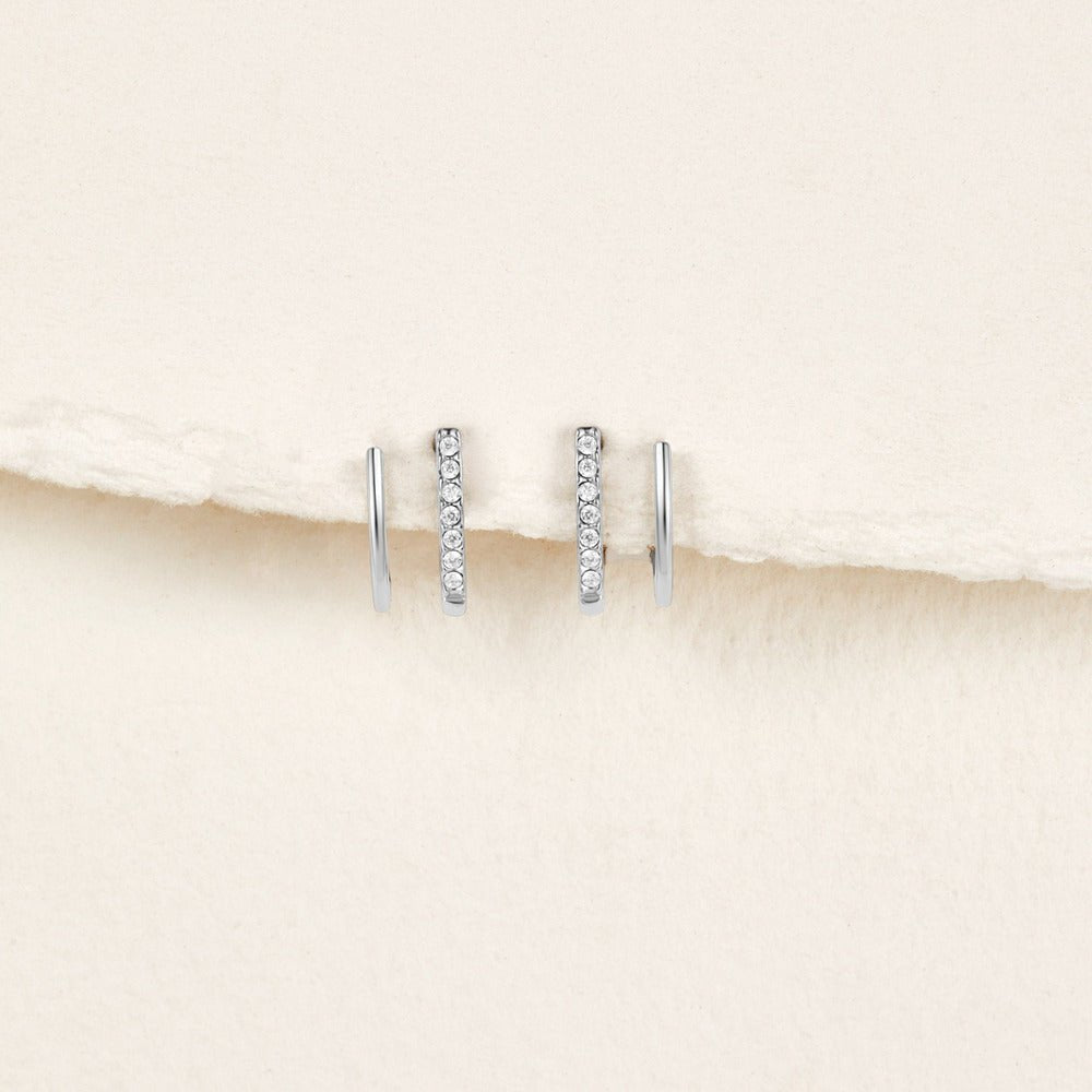 Boucles d’oreilles argentées en cristal serti griffes