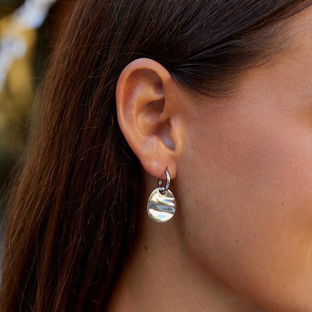 Boucles d’oreilles disque argentées