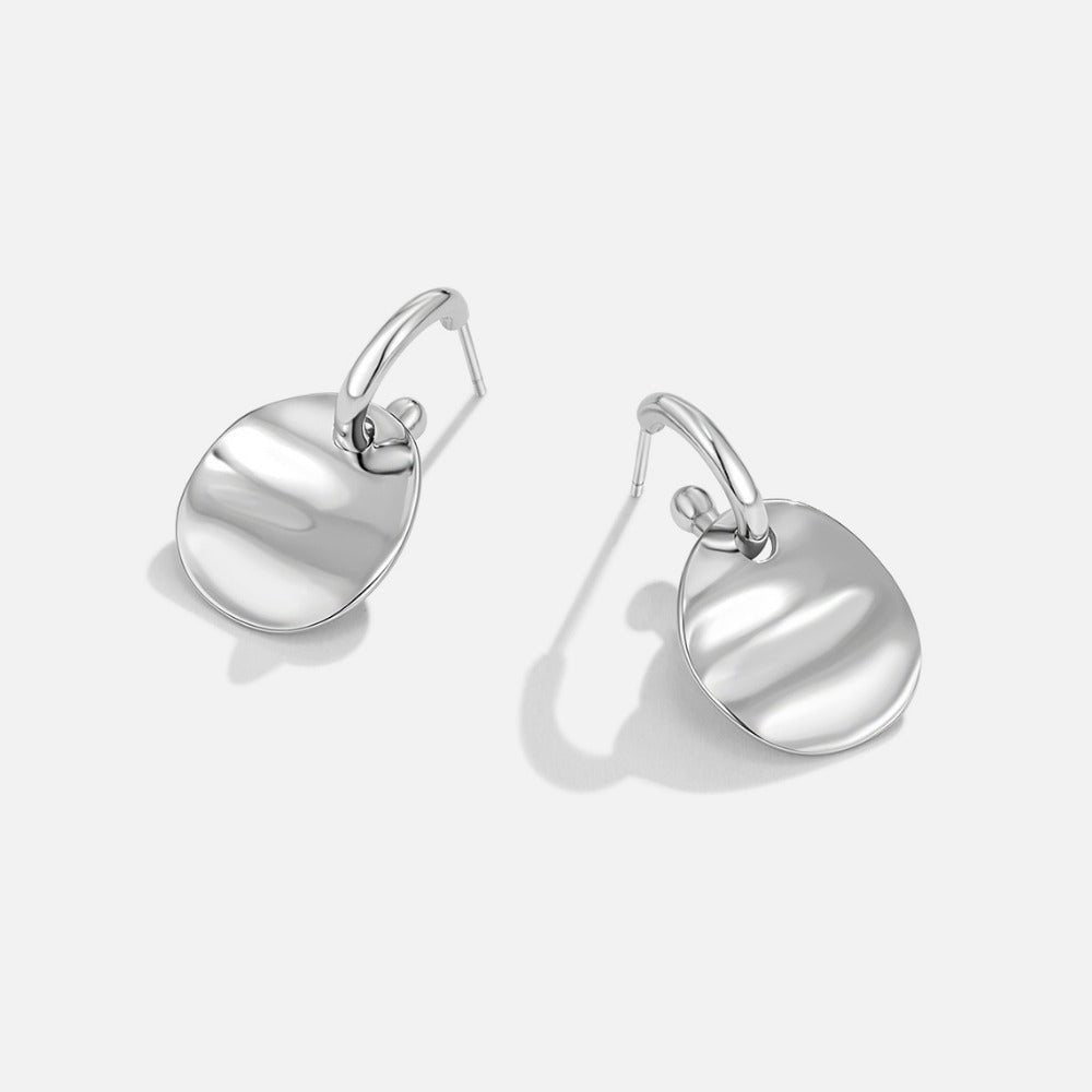 Boucles d’oreilles disque argentées