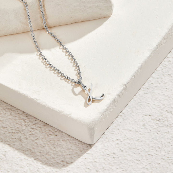 Collier argenté s písmenom v tvare srdca