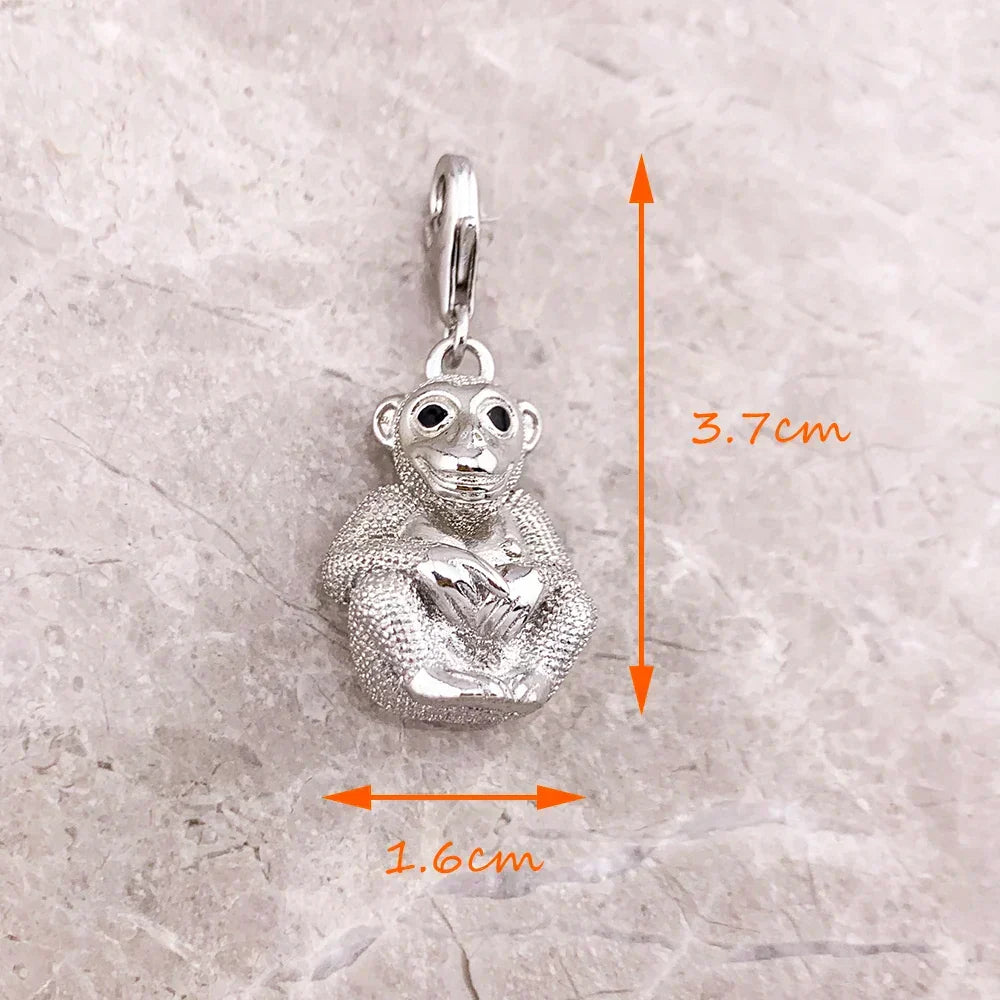 Charm Singe en argent - Maison Perle